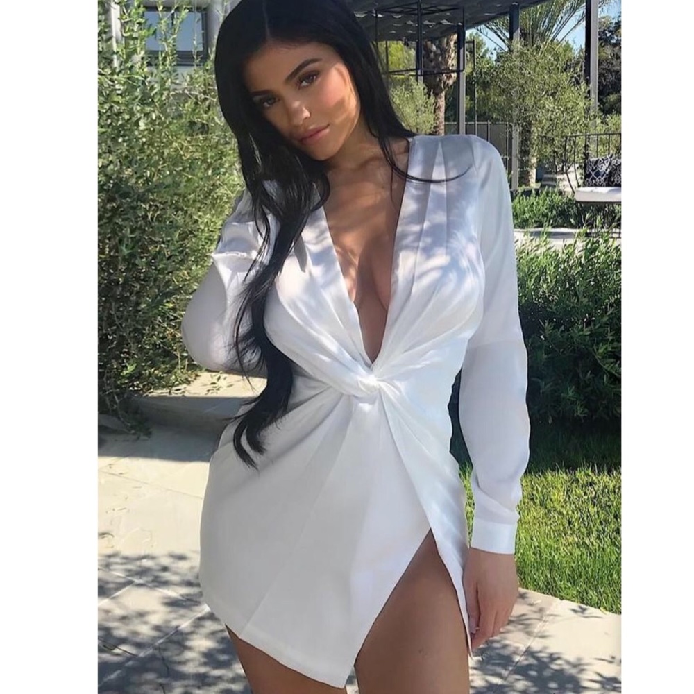 Fashion Nova White deep v dress. Size large